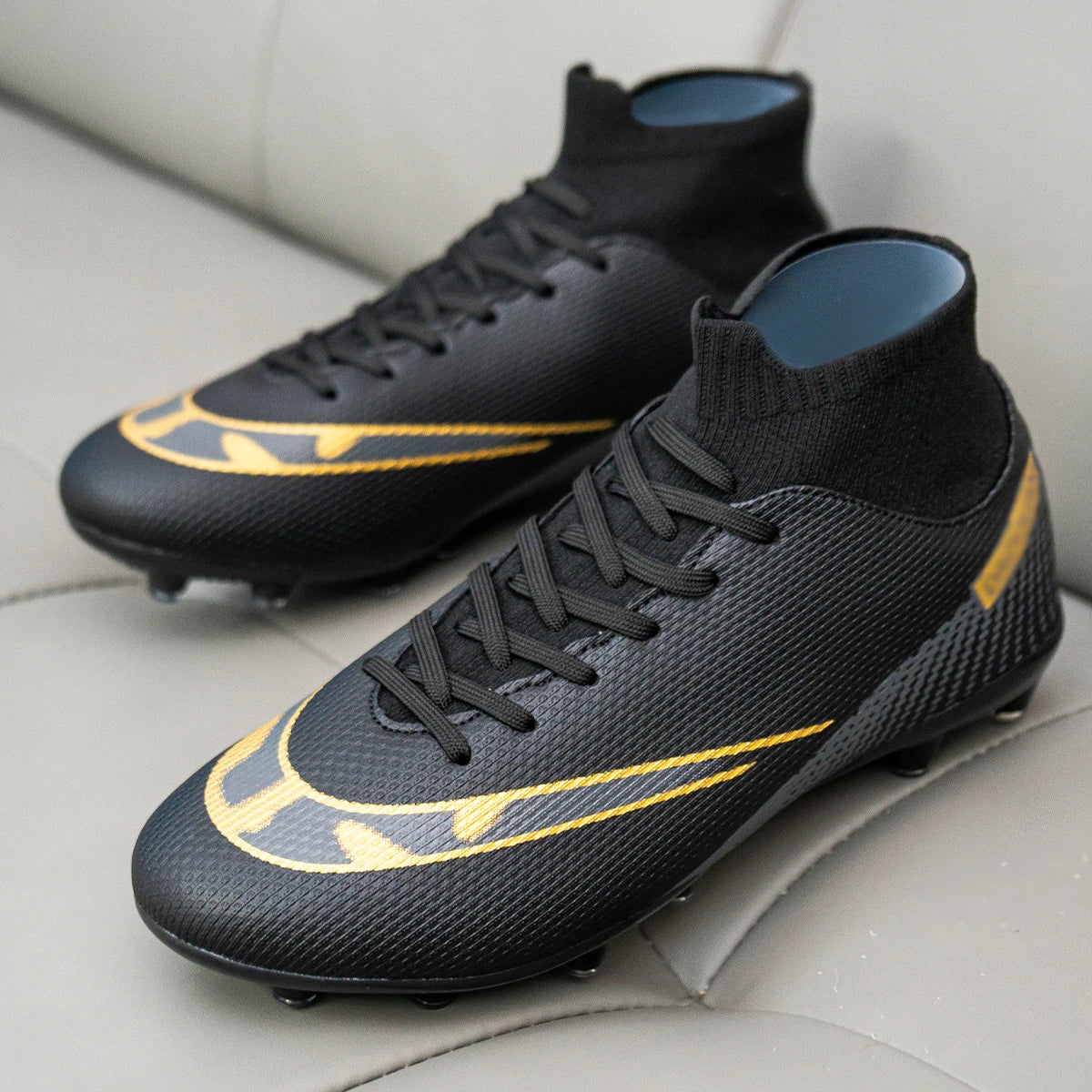 Premium high-top football shoes FG long studs and TF short studs, suitable for both men and women, offer comfort. Sole spikes